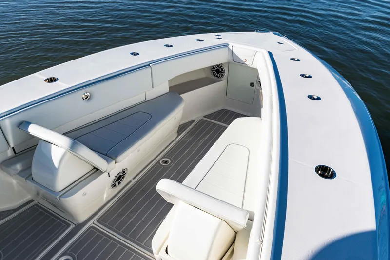  Yacht Photos Pics 2020 SeaVee 370z boat interior with cushioned seating and sleek design on calm water.