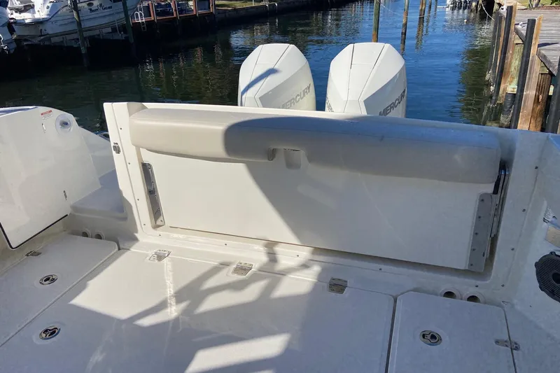  Yacht Photos Pics 2024 Boston Whaler 320 Vantage boat deck with dual Mercury engines.