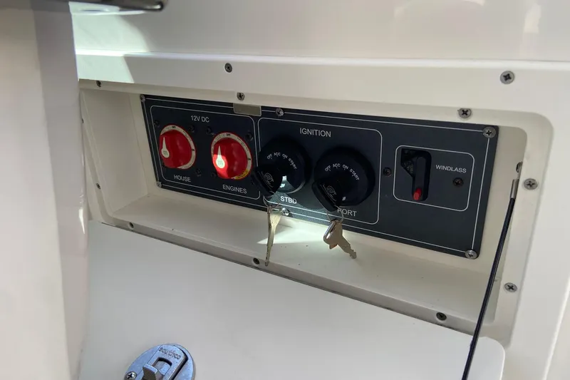  Yacht Photos Pics Control panel of 2024 Boston Whaler 320 Vantage boat with ignition and switches.