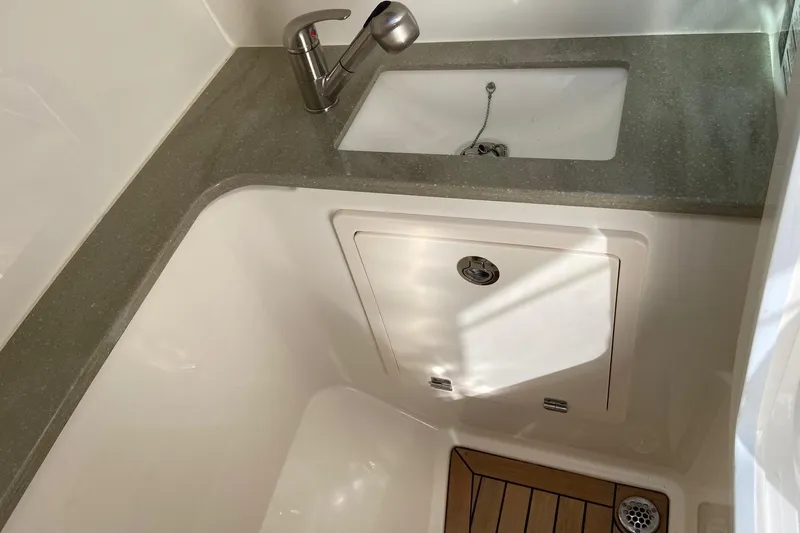  Yacht Photos Pics 2024 Boston Whaler 320 Vantage interior sink and countertop detail.