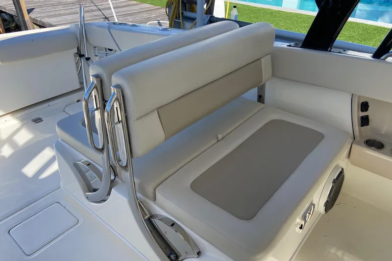  Yacht Photos Pics 2024 Boston Whaler 320 Vantage interior seating with sleek design and modern features.