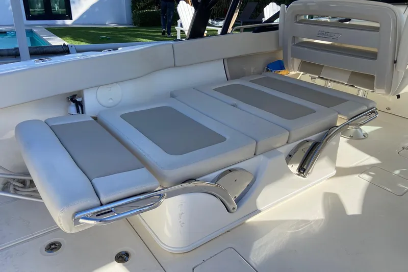  Yacht Photos Pics 2024 Boston Whaler 320 Vantage boat interior with adjustable seating and sleek design.