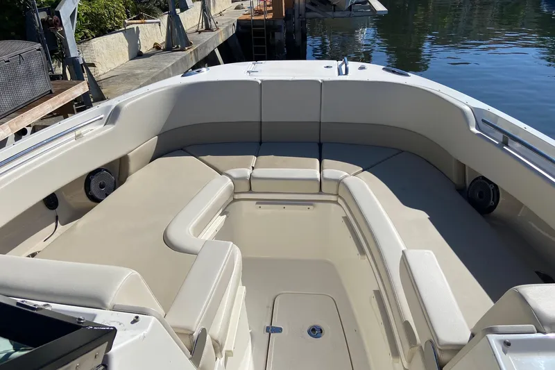  Yacht Photos Pics 2024 Boston Whaler 320 Vantage boat interior with spacious seating and modern design.