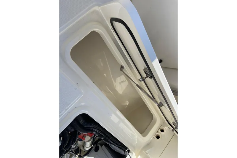  Yacht Photos Pics Open storage compartment on 2024 Boston Whaler 320 Vantage boat.