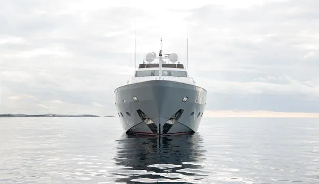  Yacht Photos Pics Front view of 2007 Admiral 34m yacht on calm water under cloudy sky.