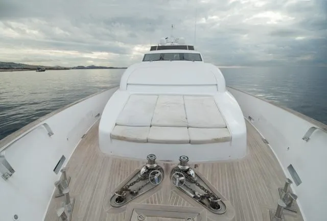  Yacht Photos Pics Luxury Admiral 34m yacht deck, 2007 model, on calm sea under cloudy sky.