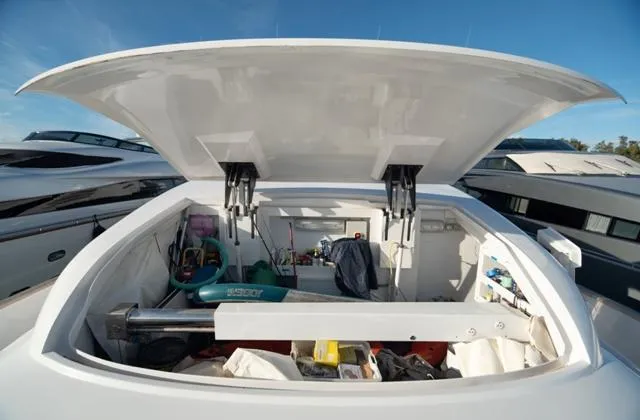  Yacht Photos Pics Open storage compartment on 2007 Admiral 34m yacht, showcasing various equipment and tools.