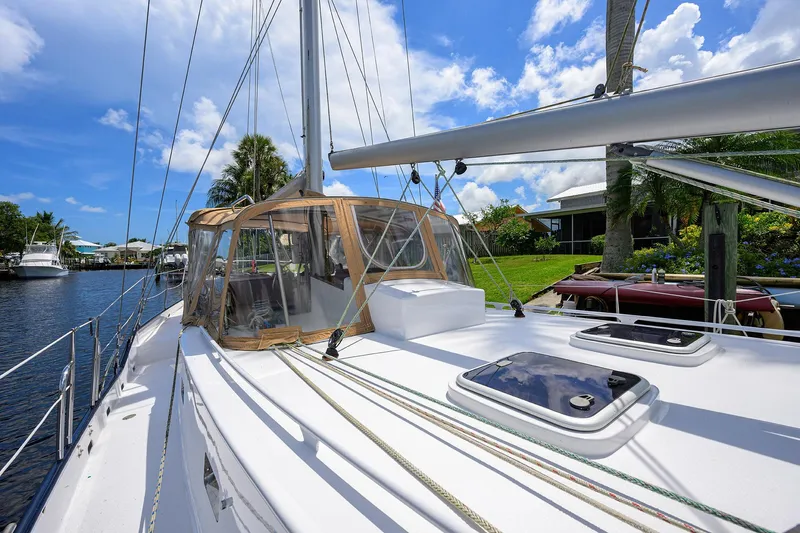 Running On Empty Yacht Photos Pics Custom 46 Dennis Schreibert Schooner, 2013, docked under clear blue sky.