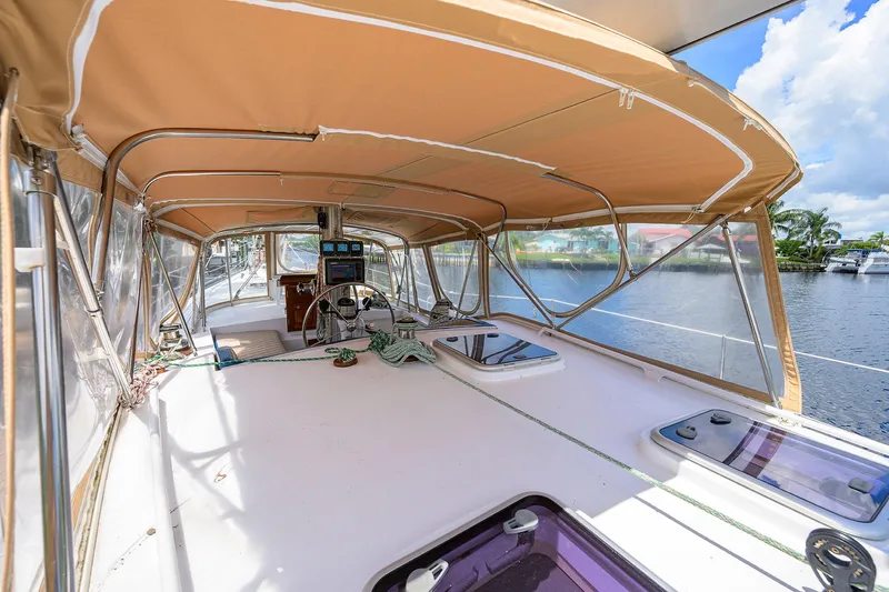 Running On Empty Yacht Photos Pics Spacious deck of 2013 Custom 46 Dennis Schreibert Schooner with tan canopy and clear panels.