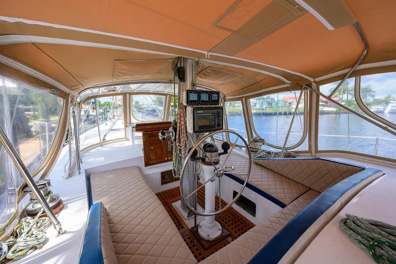 Running On Empty Yacht Photos Pics Interior of 2013 Custom 46 Dennis Schreibert Schooner with helm, seating, and navigation equipment.