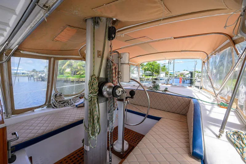 Running On Empty Yacht Photos Pics Interior view of 2013 Custom 46 Dennis Schreibert Schooner with helm and seating area.