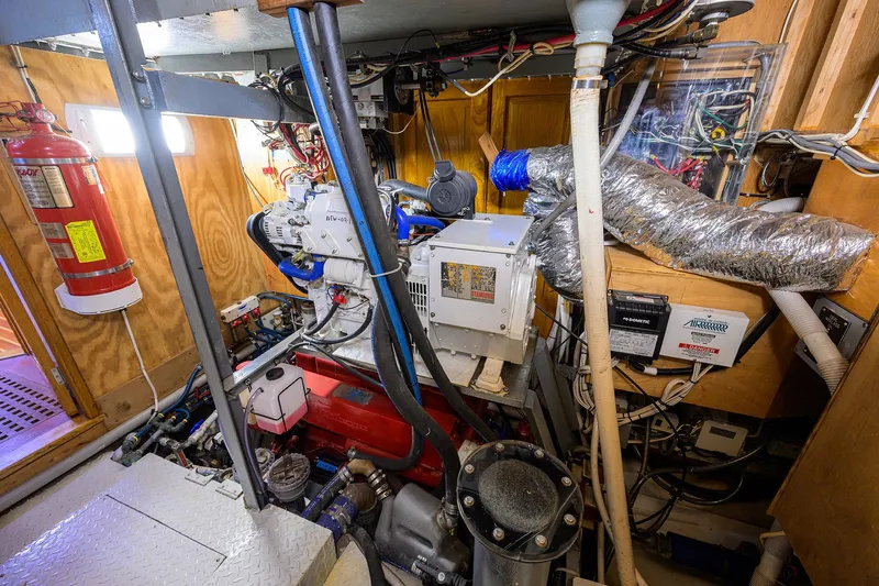 Running On Empty Yacht Photos Pics Engine room of 2013 Custom 46 Dennis Schreibert Schooner with machinery and equipment.