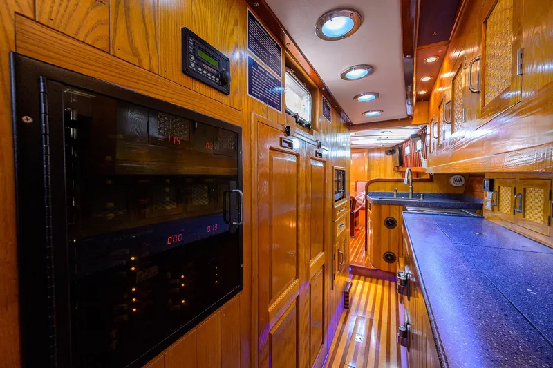 Running On Empty Yacht Photos Pics Luxurious wooden interior of 2013 Custom 46 Dennis Schreibert Schooner yacht.