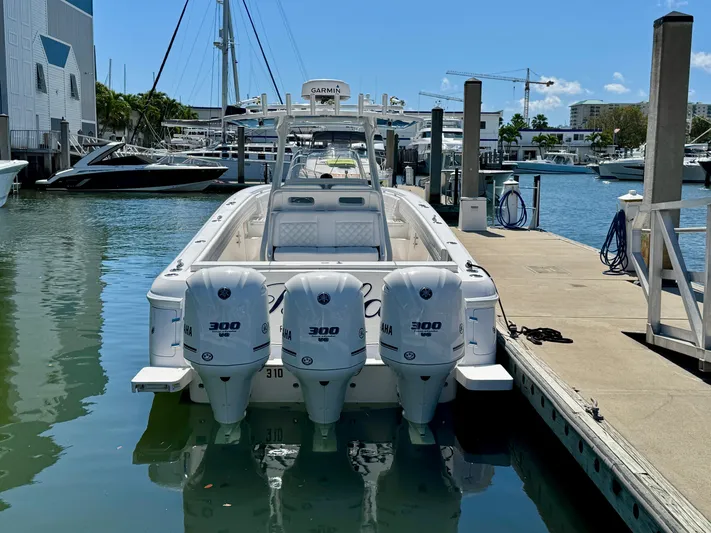  Yacht Photos Pics 2017 Intrepid 375 Center Console boat docked with triple 300 HP engines.