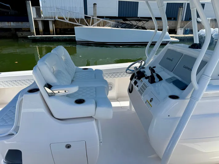 Yacht Photos Pics 2017 Intrepid 375 Center Console boat interior with helm and seating.