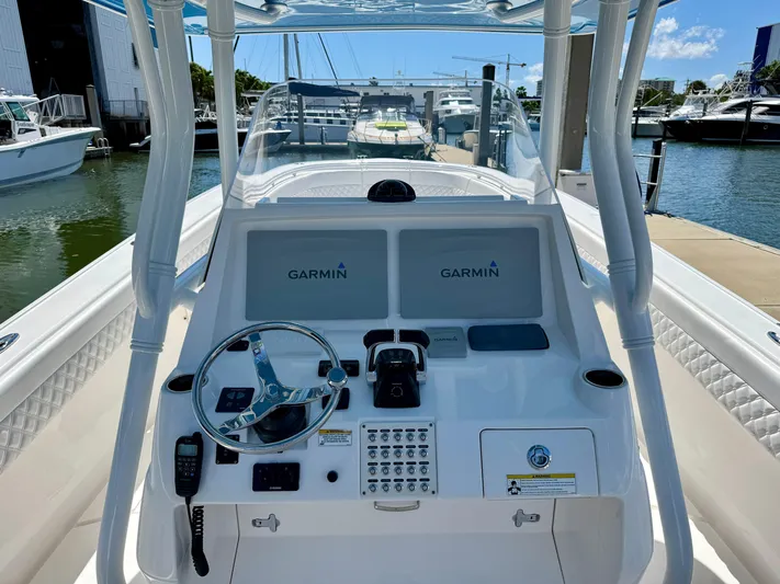  Yacht Photos Pics 2017 Intrepid 375 Center Console boat with Garmin navigation at marina dock.