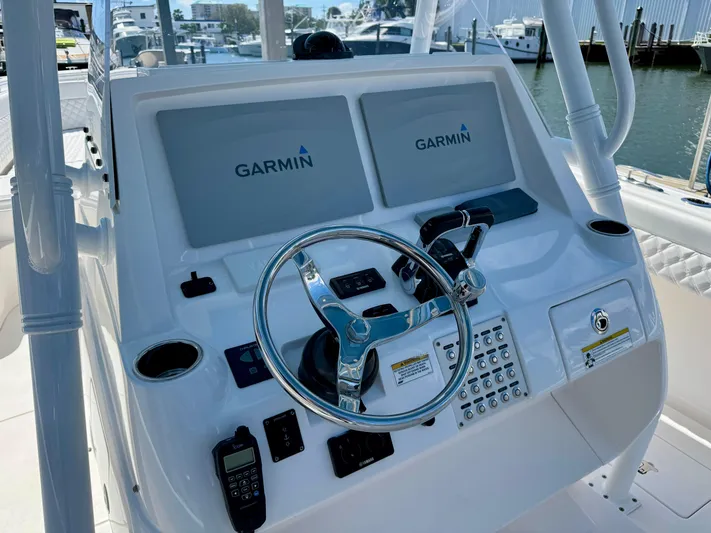  Yacht Photos Pics 2017 Intrepid 375 Center Console helm with Garmin displays and steering wheel.