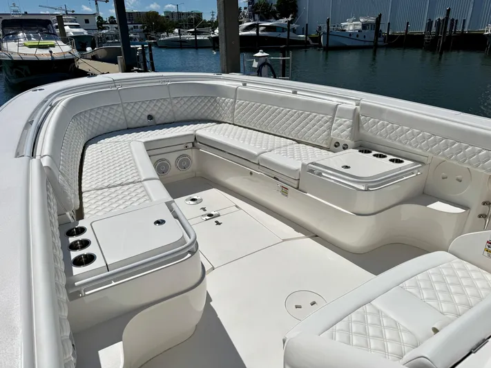  Yacht Photos Pics 2017 Intrepid 375 Center Console boat with luxurious white seating and spacious deck.