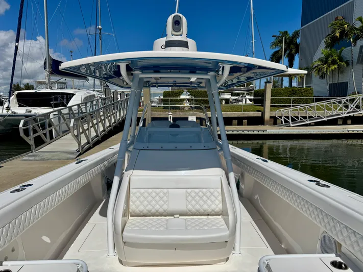  Yacht Photos Pics 2017 Intrepid 375 Center Console boat docked at marina, featuring spacious seating and modern design.
