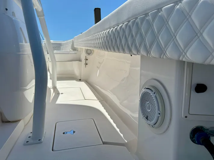  Yacht Photos Pics 2017 Intrepid 375 Center Console interior with quilted upholstery and marine speaker.