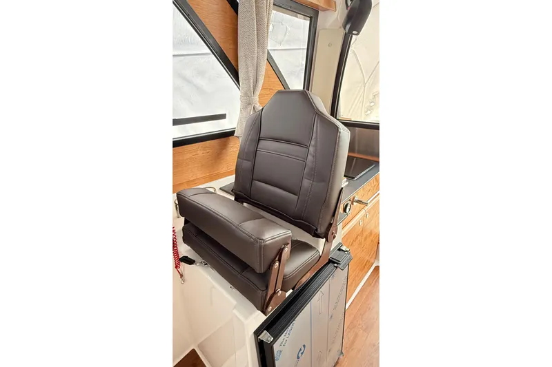  Yacht Photos Pics 2026 Cutwater C-248 Coupe interior with luxurious brown leather seating.