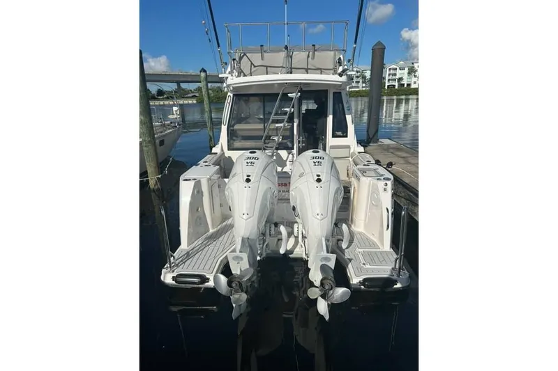 Venessa 1968 - Brokerage Kevin Yacht Photos Pics 2026 Solara S-310 SB boat with dual 300 HP engines docked at marina.