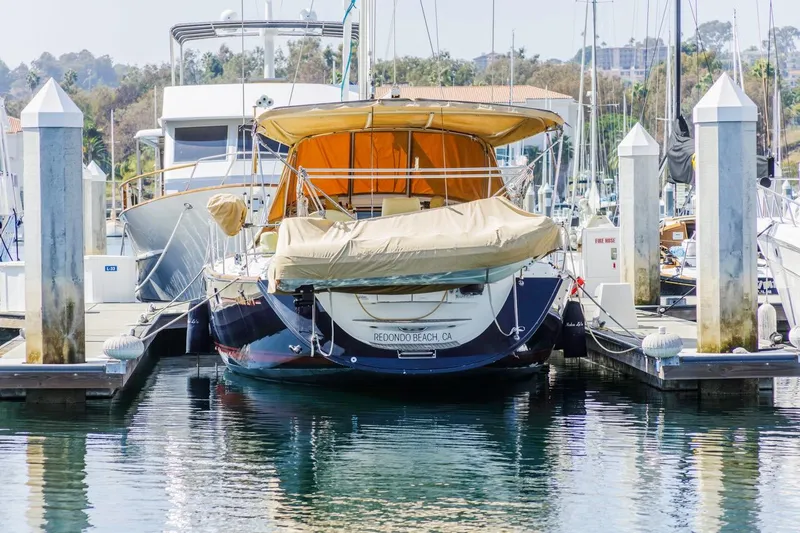 Maka Le'a Yacht Photos Pics 2006 Jeanneau DS yacht docked at marina in Redondo Beach, California.