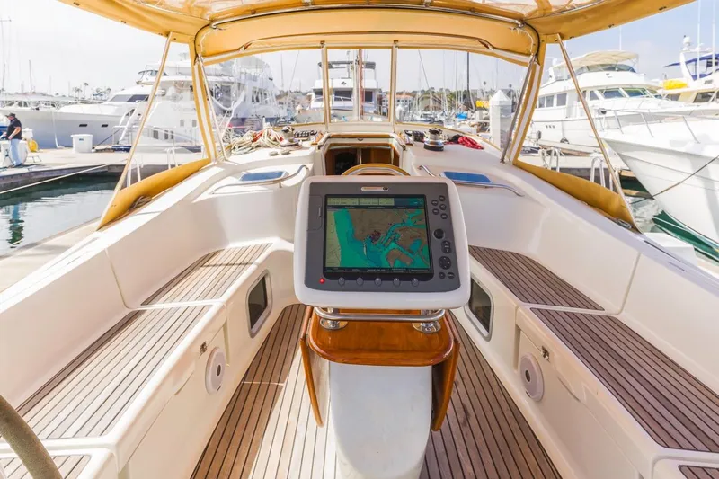 Maka Le'a Yacht Photos Pics 2006 Jeanneau DS yacht cockpit with navigation system, docked at marina.