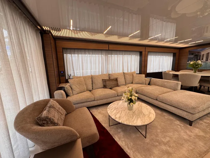  Yacht Photos Pics Luxurious interior of 2018 Ferretti Yachts 920 with elegant seating and marble table.