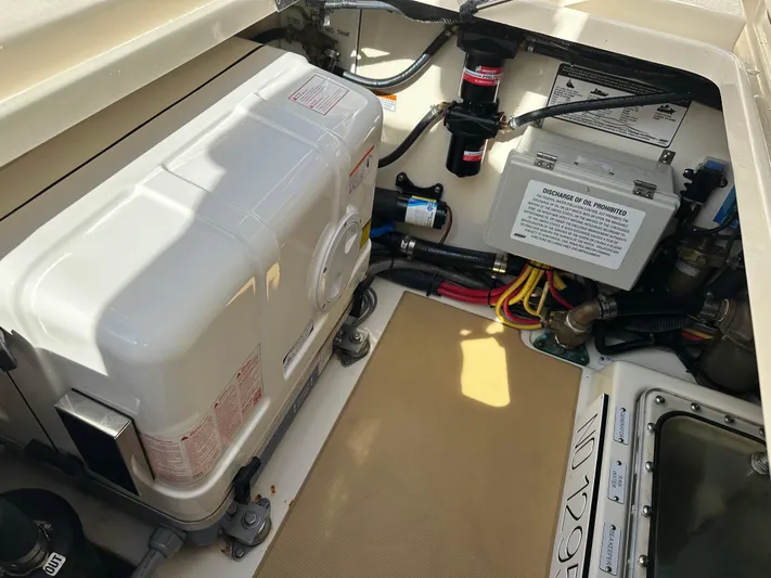  Yacht Photos Pics Engine compartment of 2019 Scout 380 LXF boat, showcasing electrical components and wiring.