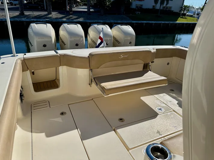  Yacht Photos Pics 2019 Scout 380 LXF boat with beige seating and multiple outboard engines.