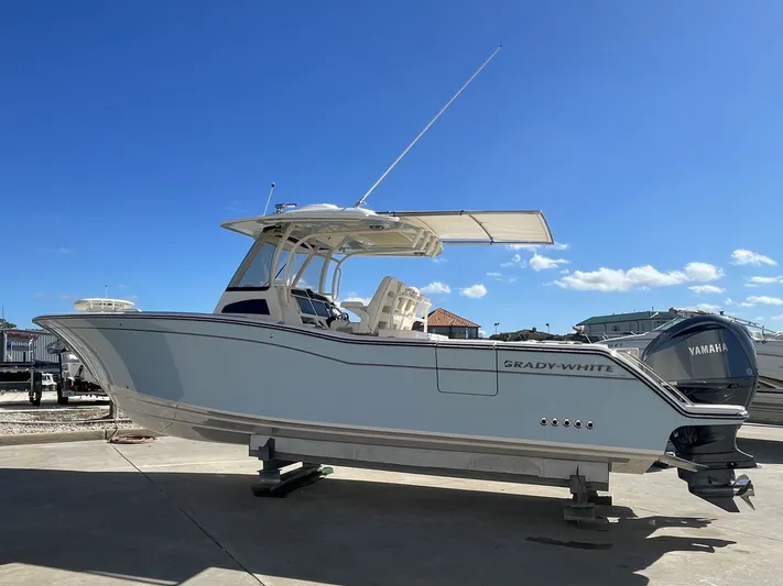  Yacht Photos Pics 2023 Grady-White Canyon 326 boat on a dock.