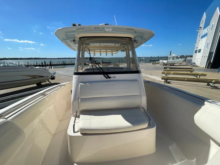  Yacht Photos Pics Grady-White Canyon 326 boat, 2023 model, docked under sunny skies.