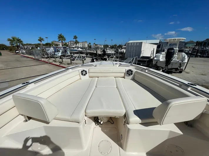  Yacht Photos Pics 2023 Grady-White Canyon 326 boat with luxurious seating area.