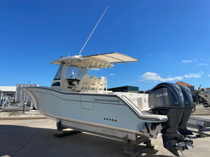  Yacht Photos Pics 2023 Grady-White Canyon 326 boat with Yamaha engines outdoors.
