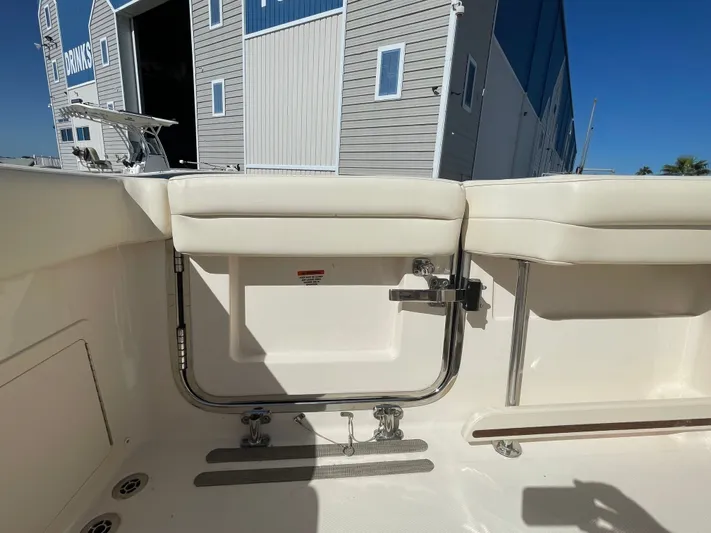  Yacht Photos Pics 2023 Grady-White Canyon 326 boat with white interior and stainless steel fittings.