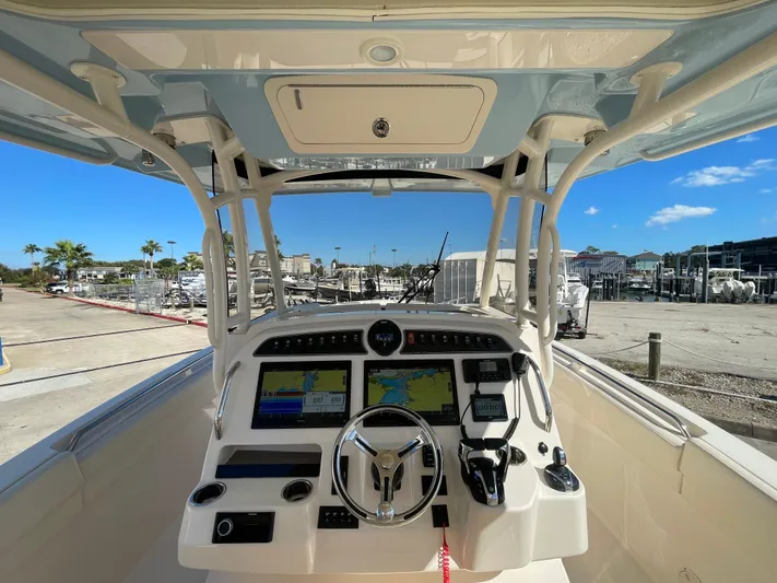  Yacht Photos Pics Interior view of 2023 Grady-White Canyon 326 boat with modern helm console.