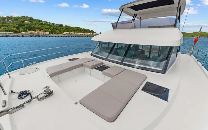Mona Lisa Yacht Photos Pics 2024 Fountaine Pajot MY.6 yacht with spacious deck and scenic ocean view.