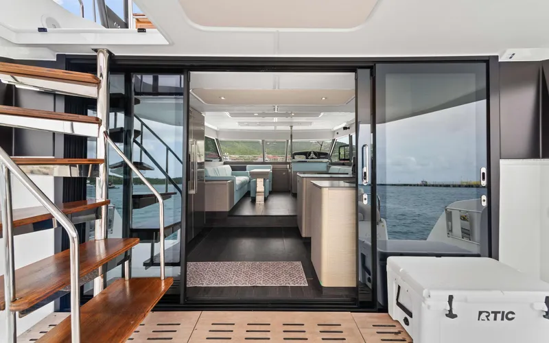 Mona Lisa Yacht Photos Pics 2024 Fountaine Pajot MY.6 yacht interior with modern design and ocean view.