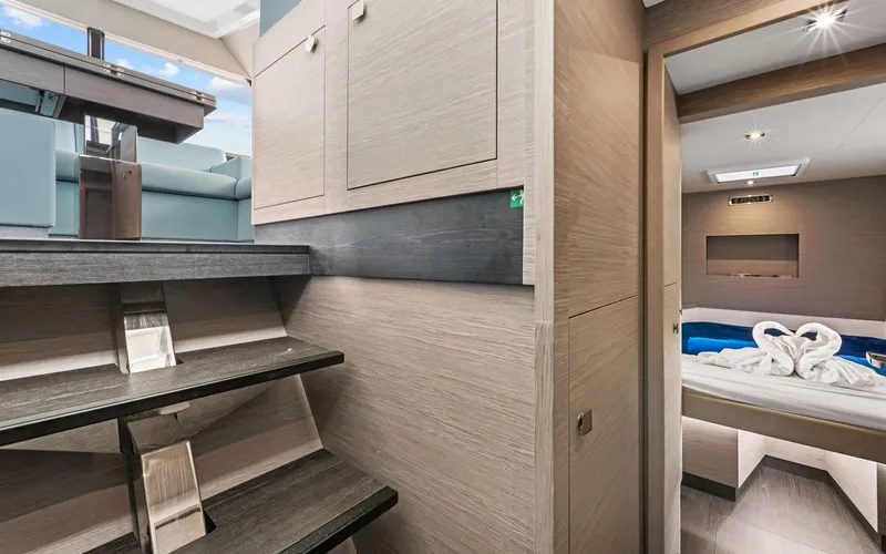 Mona Lisa Yacht Photos Pics Luxurious interior of 2024 Fountaine Pajot MY.6 yacht with modern design and cozy bedroom.