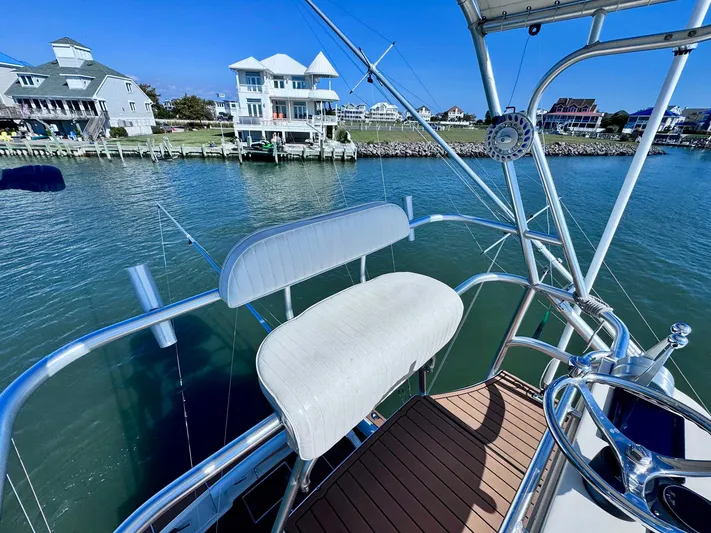 Triple Play Yacht Photos Pics 2005 Carolina Classic 35 boat with waterfront view and residential backdrop.