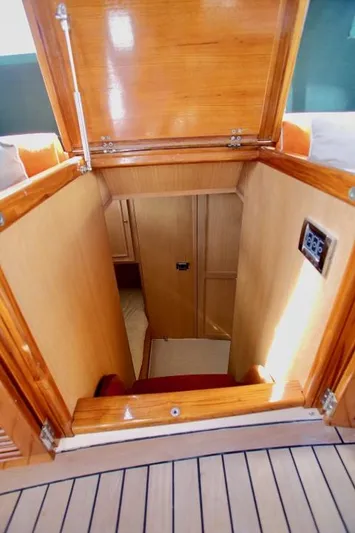 Aenaria Yacht Photos Pics Wooden hatch entrance on a 2008 Morgan 70 yacht, showcasing interior craftsmanship.