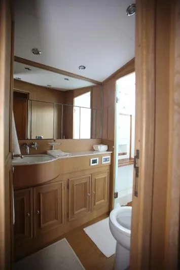Aenaria Yacht Photos Pics Luxurious wooden bathroom interior in a 2008 Morgan 70 yacht.
