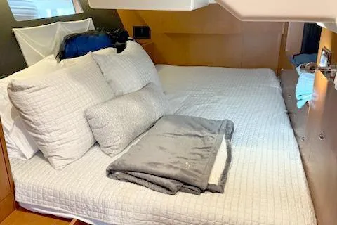  Yacht Photos Pics 2017 Beneteau Oceanis 41.1 cabin interior with cozy bedding and modern design.