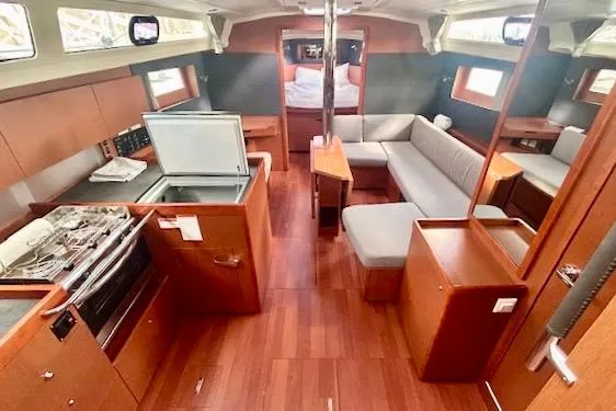  Yacht Photos Pics Interior of 2017 Beneteau Oceanis 41.1 yacht with modern kitchen and seating area.