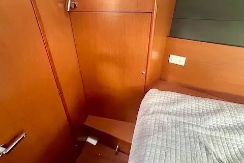  Yacht Photos Pics 2017 Beneteau Oceanis 41.1 cabin interior with wooden finish and bed.