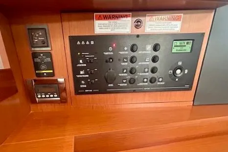  Yacht Photos Pics Control panel of a 2017 Beneteau Oceanis 41.1 sailboat, featuring various switches and indicators.