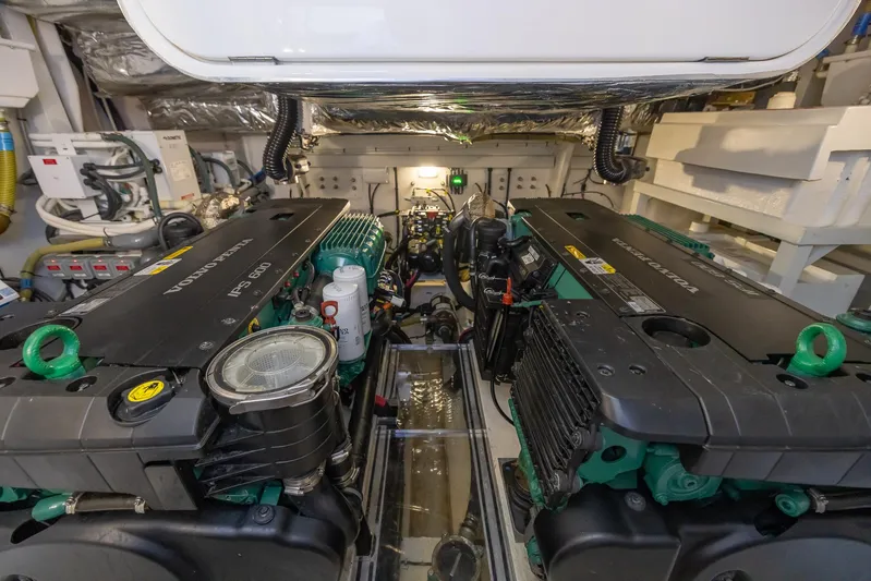 Quick Decision Yacht Photos Pics Engine room of a 2020 Princess V50 yacht with twin engines.