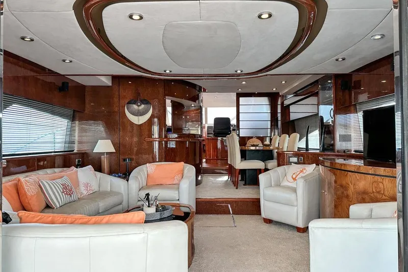  Yacht Photos Pics Luxurious interior of 2004 FAIRLINE SQUADRON 74 yacht with elegant seating and modern decor.