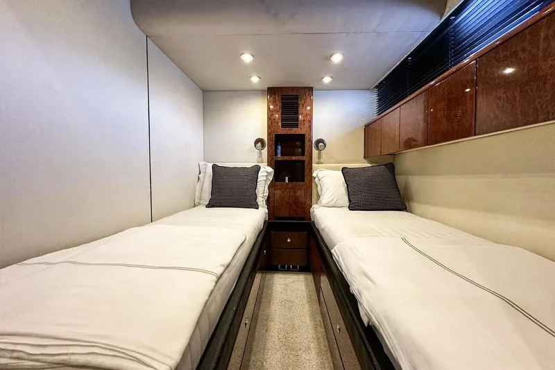  Yacht Photos Pics Luxurious twin cabin interior of 2004 FAIRLINE SQUADRON 74 yacht.